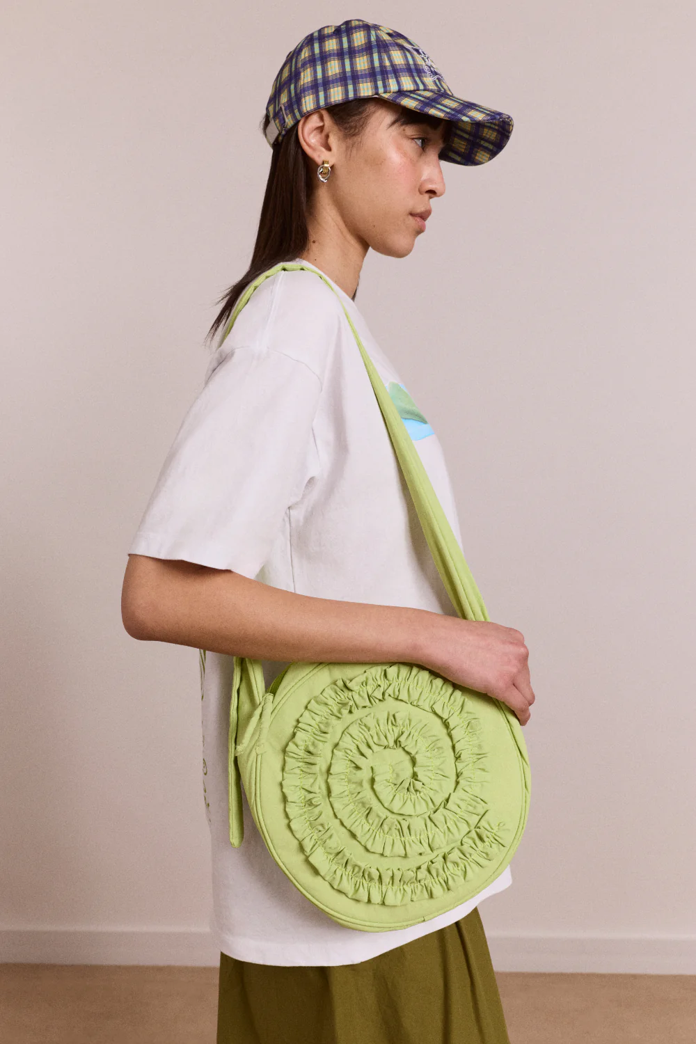 47-rae-circle-swirl-bag-celery-1.webp Rae Circle Swirl Bag - Celery